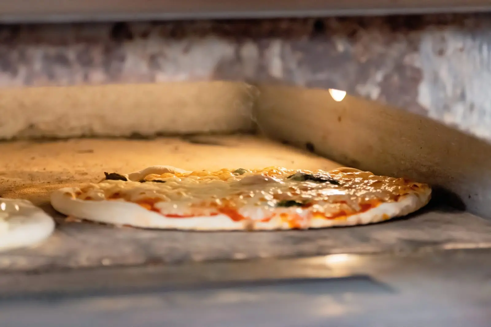 Pizza sortie du four