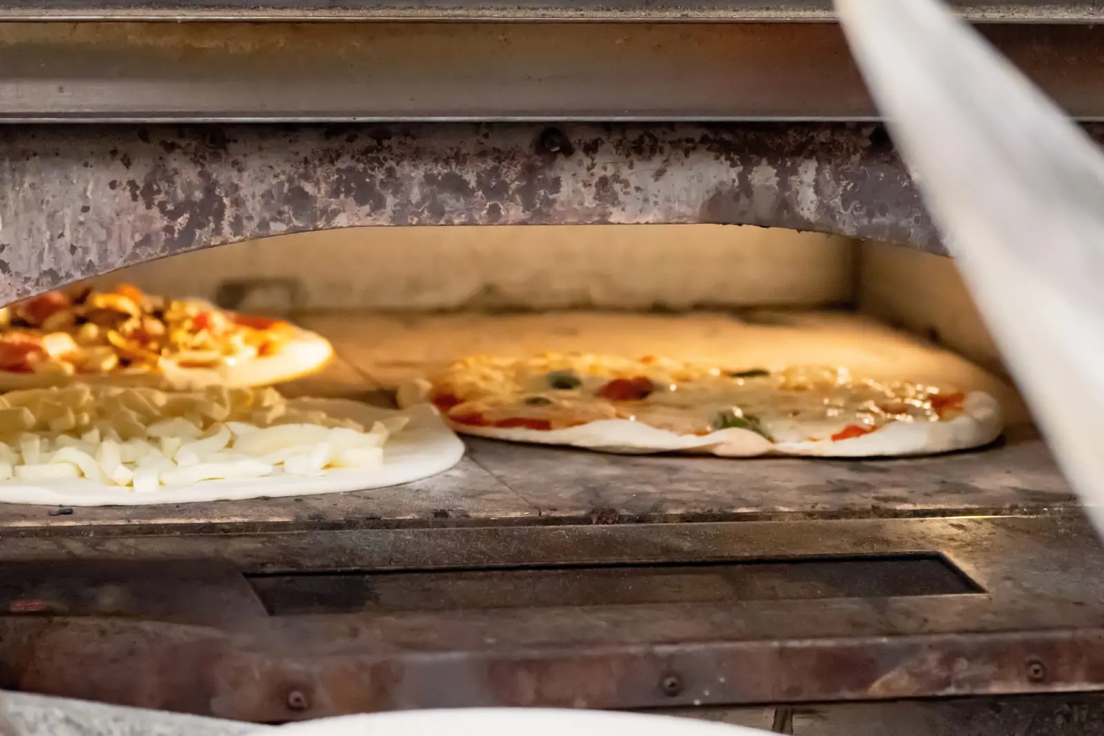 Pizzas en cuisson